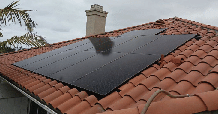 Side view of solar panels from a residential installation.
