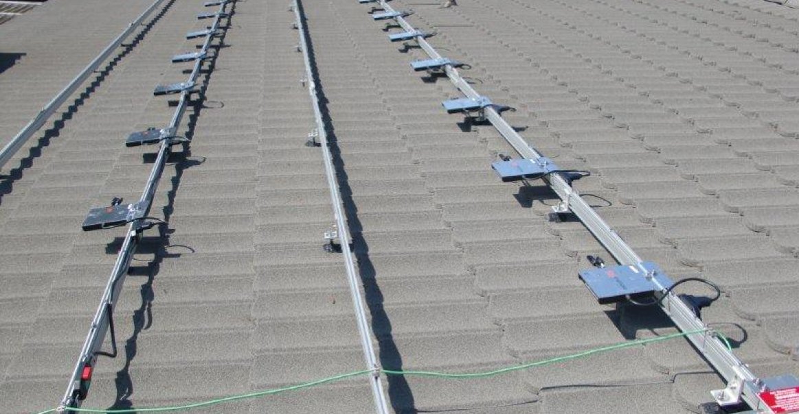 5.8kW Enphase System on Decra-Tile Roof in Pacific Beach Enphase microinverters mounted on rails
