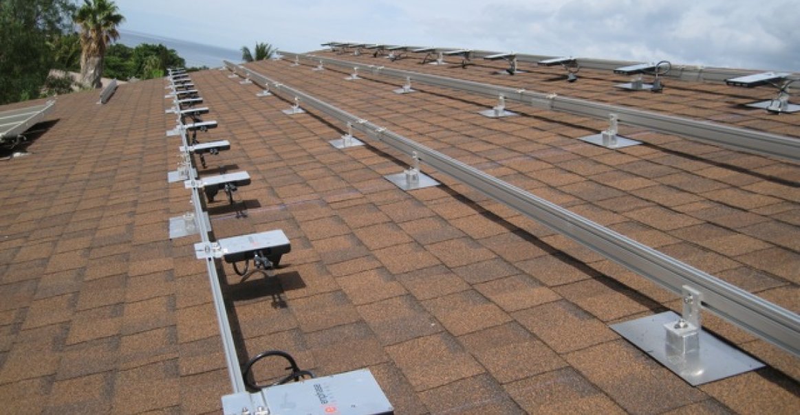 6.6kW Enphase System on Composite Shingle Enphase M215 mounted on the rails