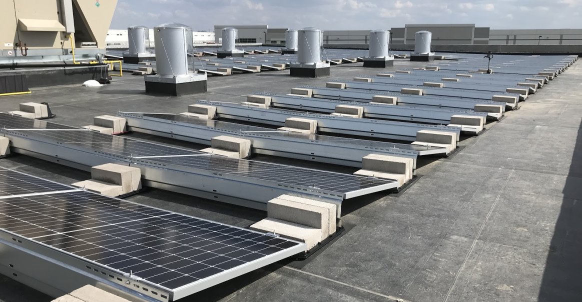 Ballasted racking with the EcoFoot2+ flat roof system EcoFoot2+ flat roof racking system