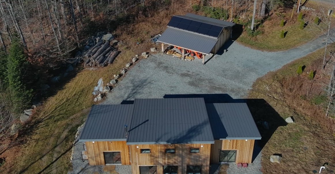 Bird's eye view of residential roof mount installation in Londonderry, VT. Bird's eye view of residential roof mount installation in Londonderry, VT.
