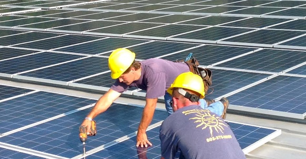 Solar Pro Installers applying the finishing touches Southern Vermont Solar Installation
