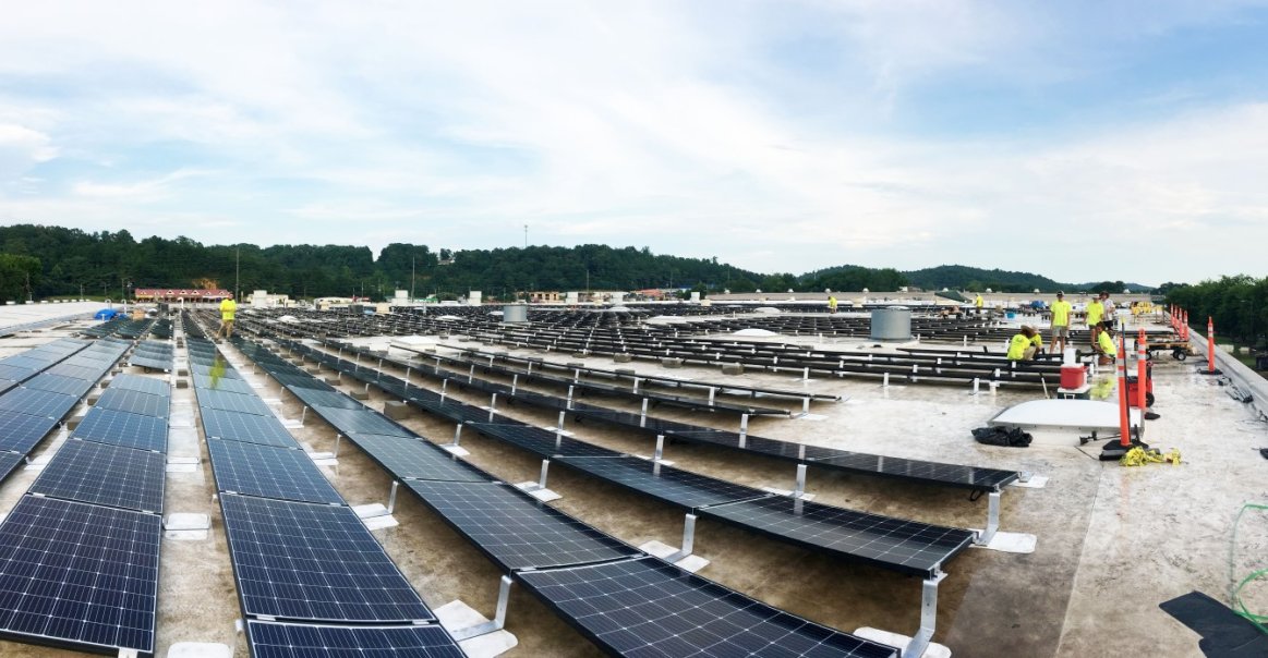 Solar Designers and Installers on Commercial Installation Site Solar Designers and Installers on Commercial Installation Site