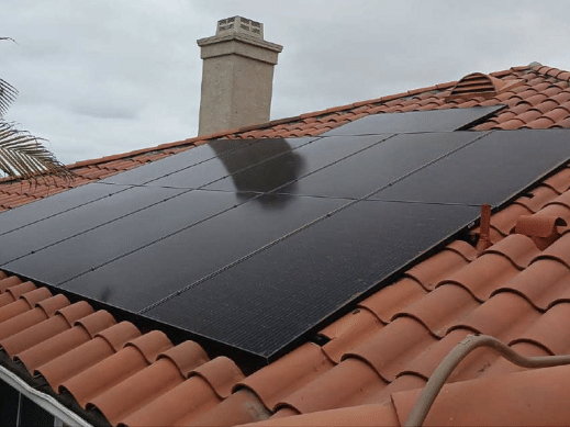 Side view of solar panels from a residential installation.